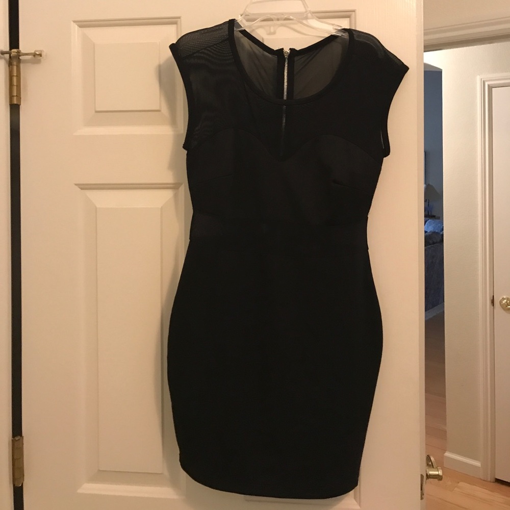 Black mini dress with sheer paneling